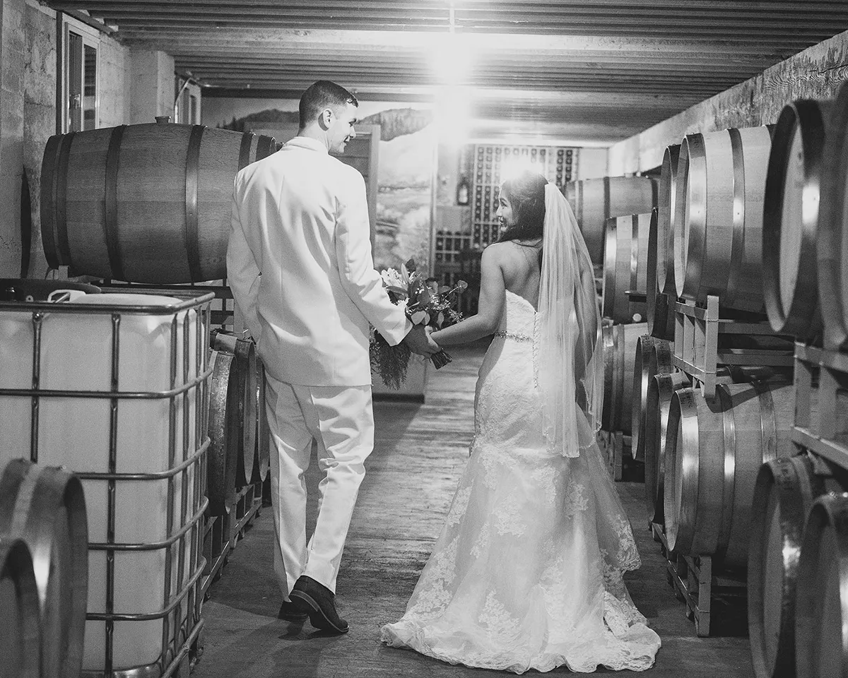 Black and white wedding portrait inside winery at Chateau Faire Le Pont Wenatchee
